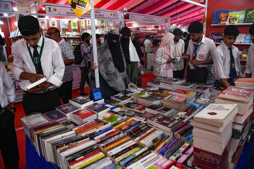 Book lovers browsing books at the Chinar Book