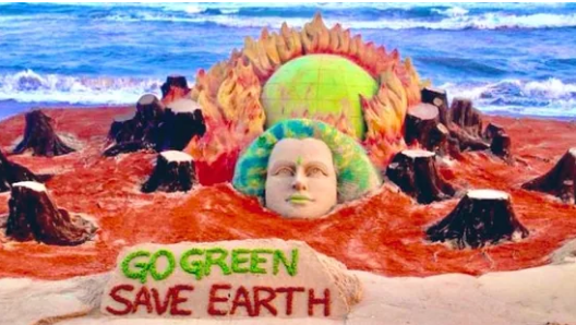 Earth Day 2021: Sand artist urges people to ‘Go green’ with stunning sculpture